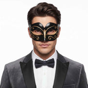 Black Venetian masquerade mask with gold filigree detailing