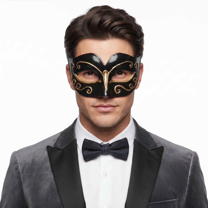 Black Venetian masquerade mask with gold filigree detailing