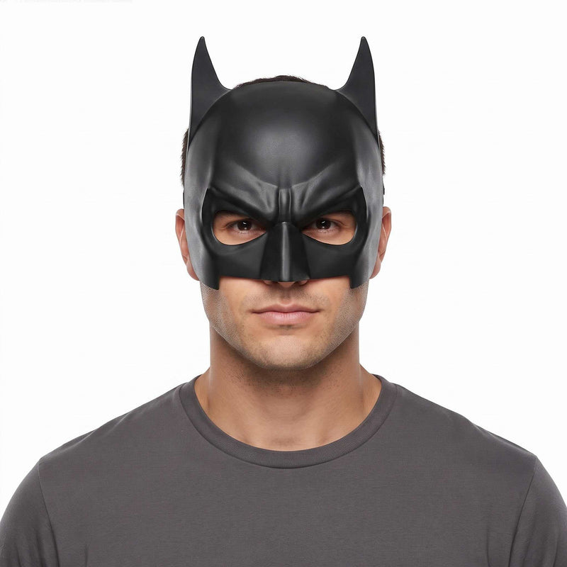Black superhero bat mask for adults with pointed bat ears on white background.